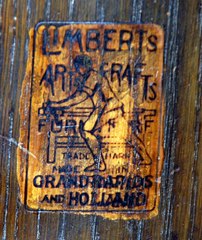 Signed in the drawer with the firms brand:
"Limbert's Arts & Crafts Furniture, made in Grand Rapids and Holland (Michigan)"